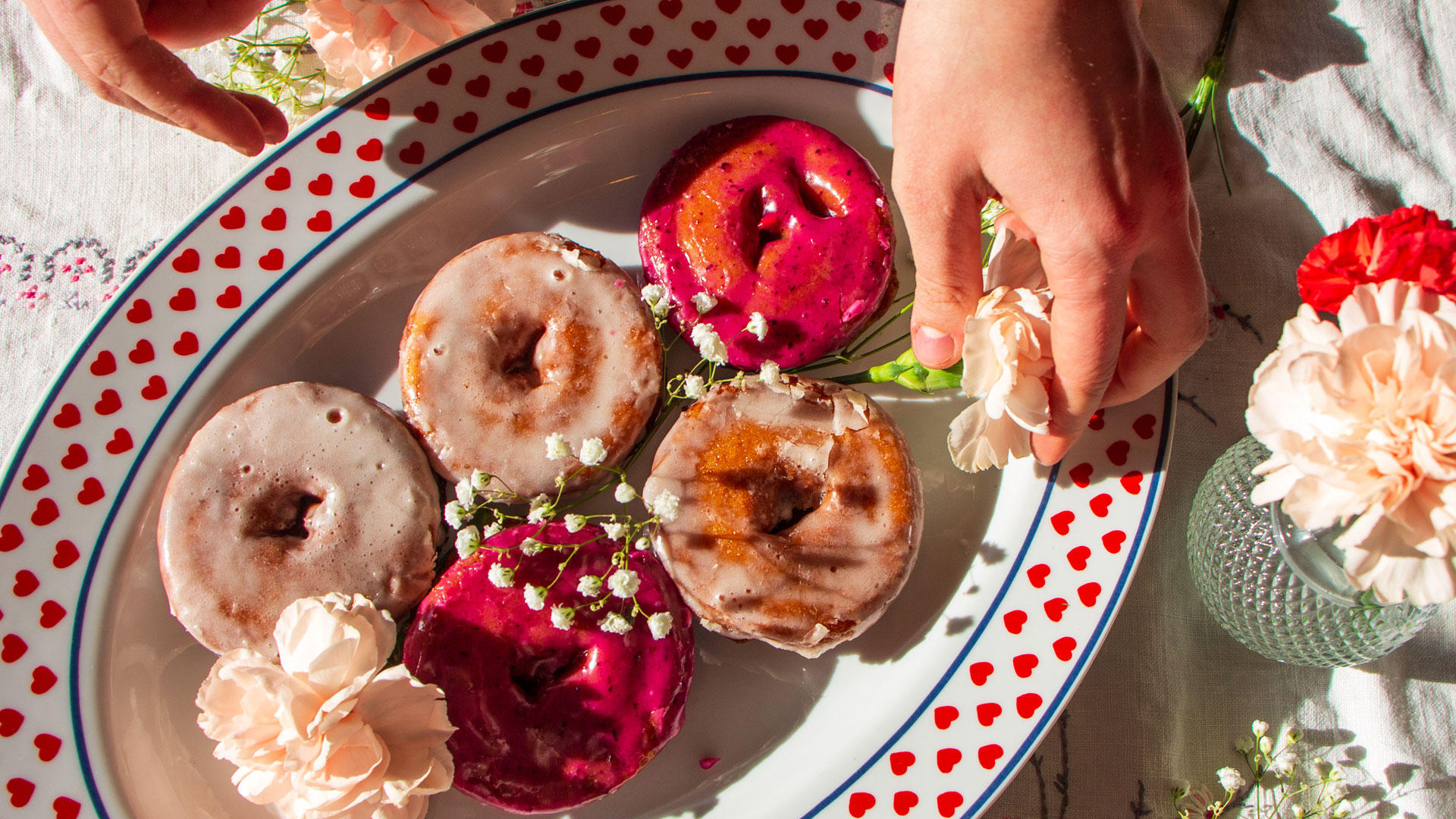Assorted Donuts on a decorative plate with flowers